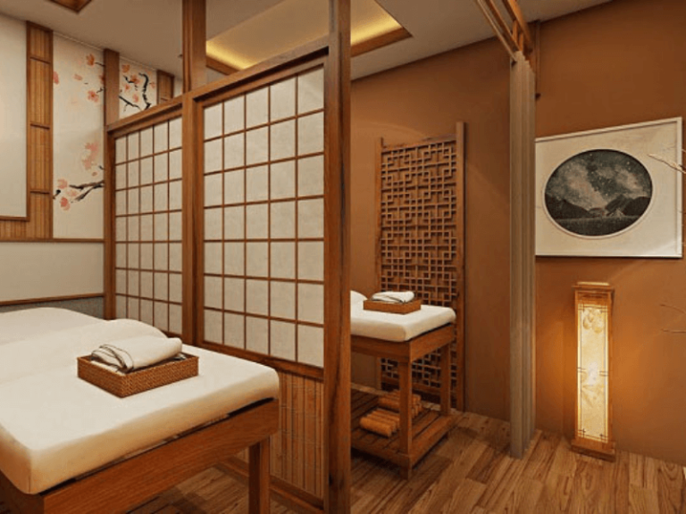 Không gian spa sử dụng vật liệu gỗ và đá tự nhiên tạo cảm giác thư thái và gần gũi